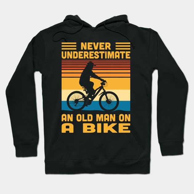 Never Underestimate An Old Man On A Bike Hoodie by Vcormier